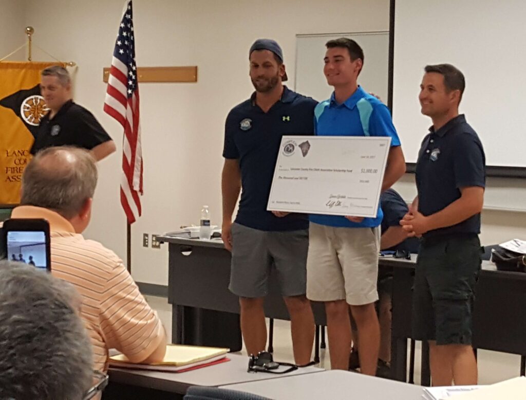 man receiving a check