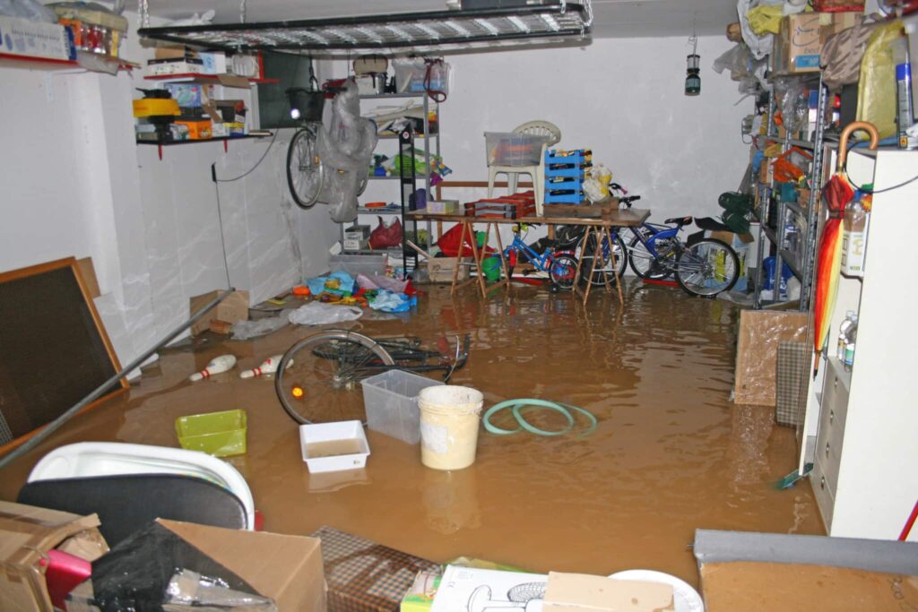 Flooded Garage with stuff laying around